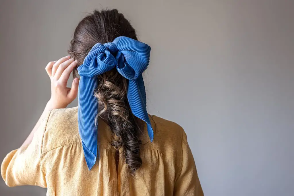 Sleek Ponytails with colorful Ribbons